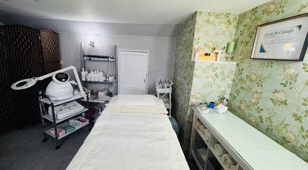 Relaxing treatment room at Pure Face Works at Utopia Hair Salon & Facial Clinic, Sidmouth, England, GB.