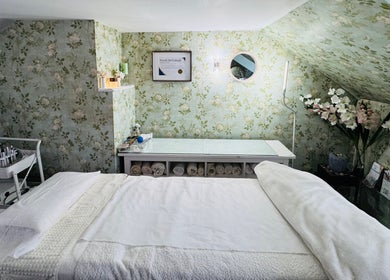 Cozy treatment room at Pure Face Works in Utopia Hair Salon & Facial Clinic, Sidmouth, England, GB.