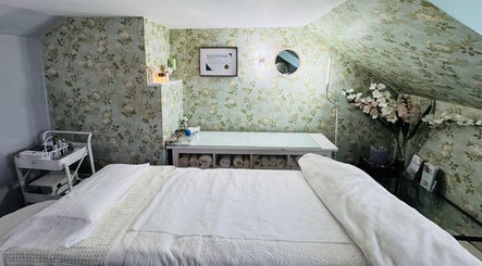 Cozy treatment room at Pure Face Works in Utopia Hair Salon & Facial Clinic, Sidmouth, England, GB.