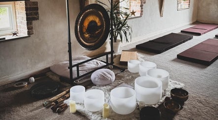 Serene meditation space at Mrs Peony, Shepshed, England, GB showcasing sound bowls and mats.