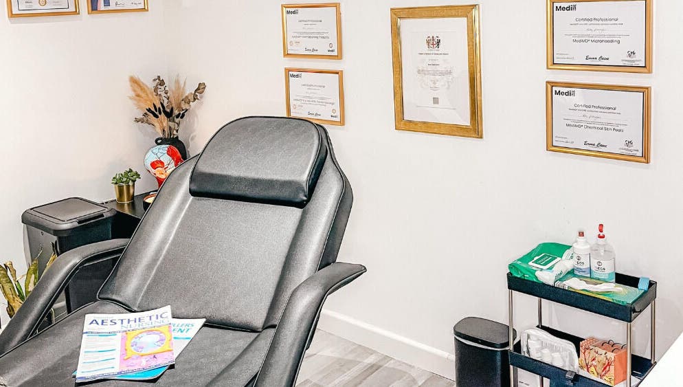Elegant interior of The Cheshire Clinic - Newton le Willows with a treatment chair and certificates in Newton-le-Willows, England, GB.