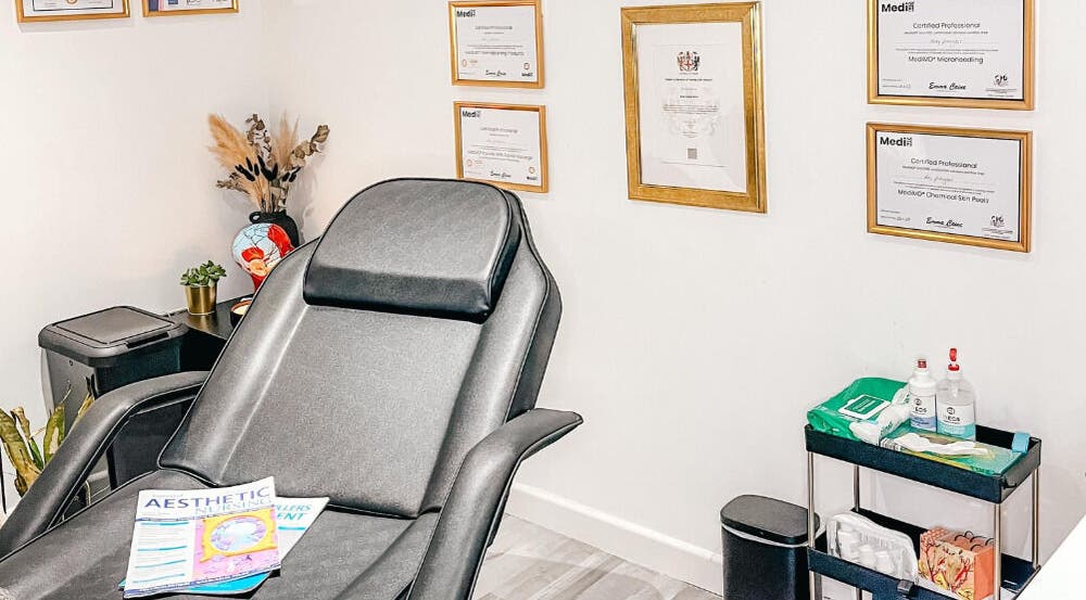 Elegant interior of The Cheshire Clinic - Newton le Willows with a treatment chair and certificates in Newton-le-Willows, England, GB.