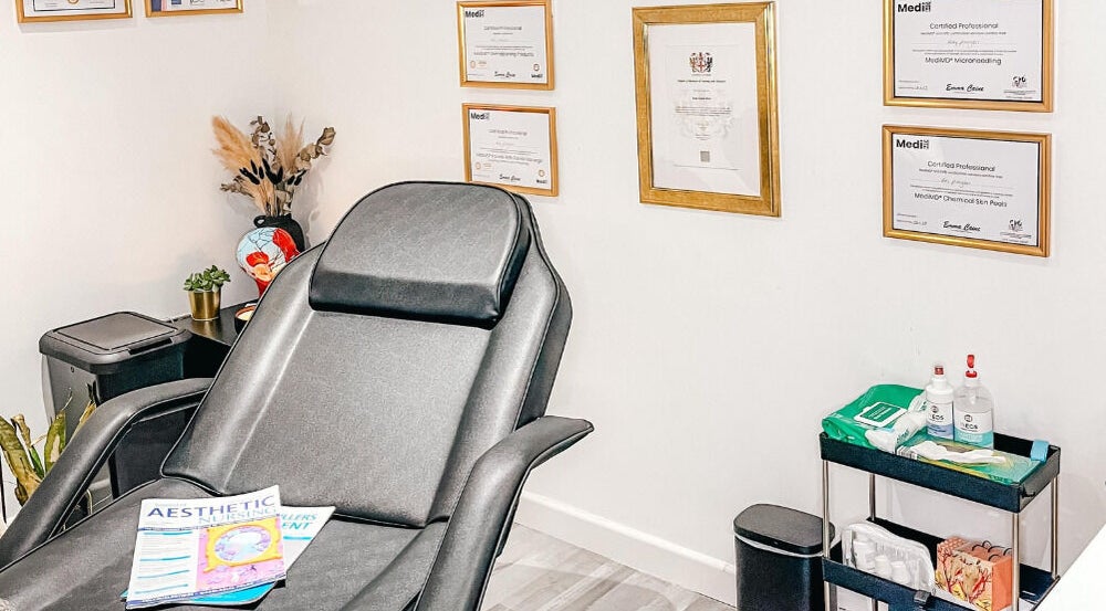 Elegant interior of The Cheshire Clinic - Newton le Willows with a treatment chair and certificates in Newton-le-Willows, England, GB.