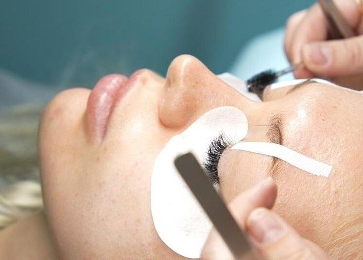 Close-up of a lash extension procedure at PAFOS, Dubai, Dubai, AE, showcasing precise beauty techniques.