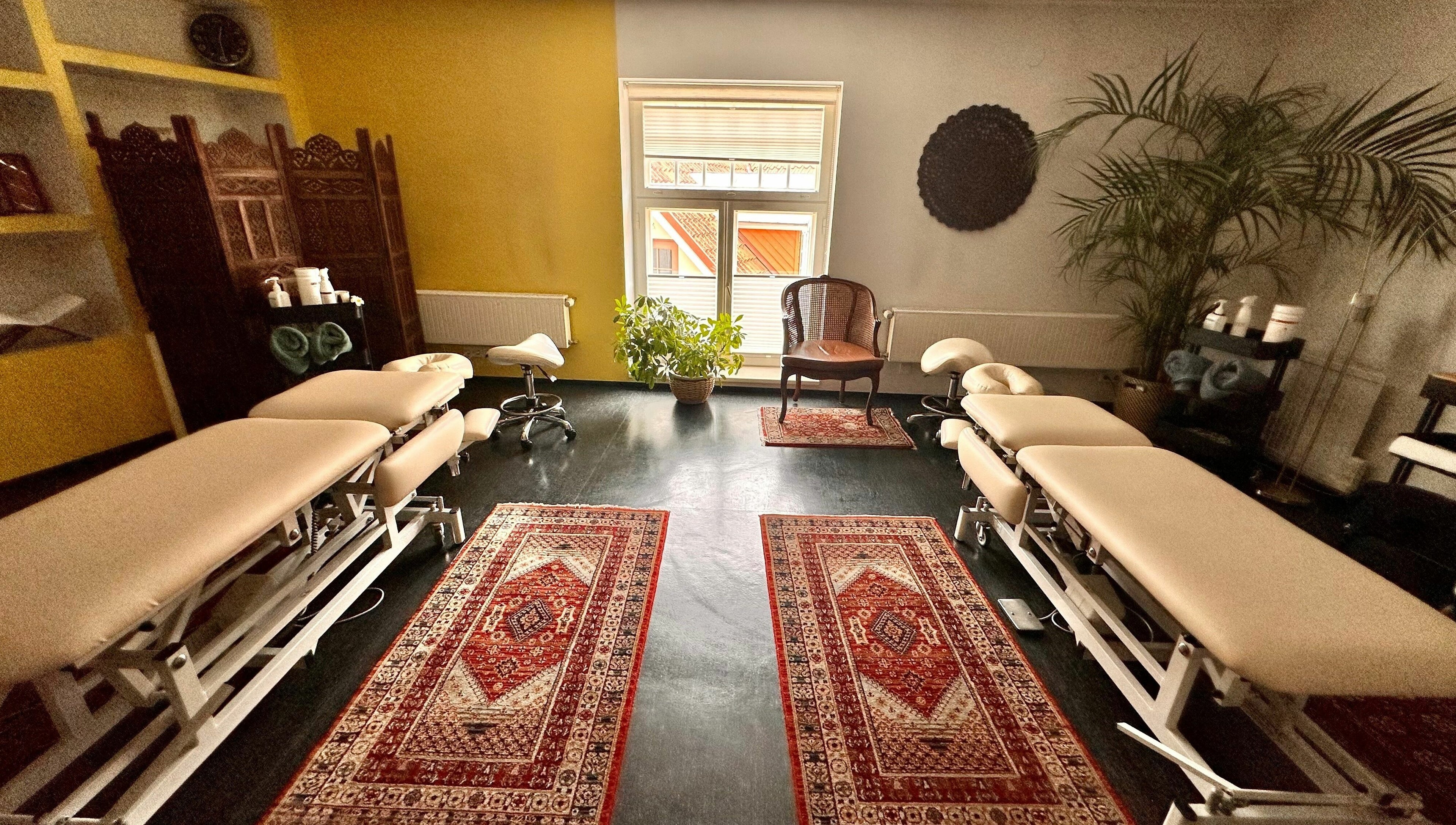 Luxurious massage room at MassaažiStaap, Tallinn, Harju maakond, EE, featuring plush tables and serene decor.