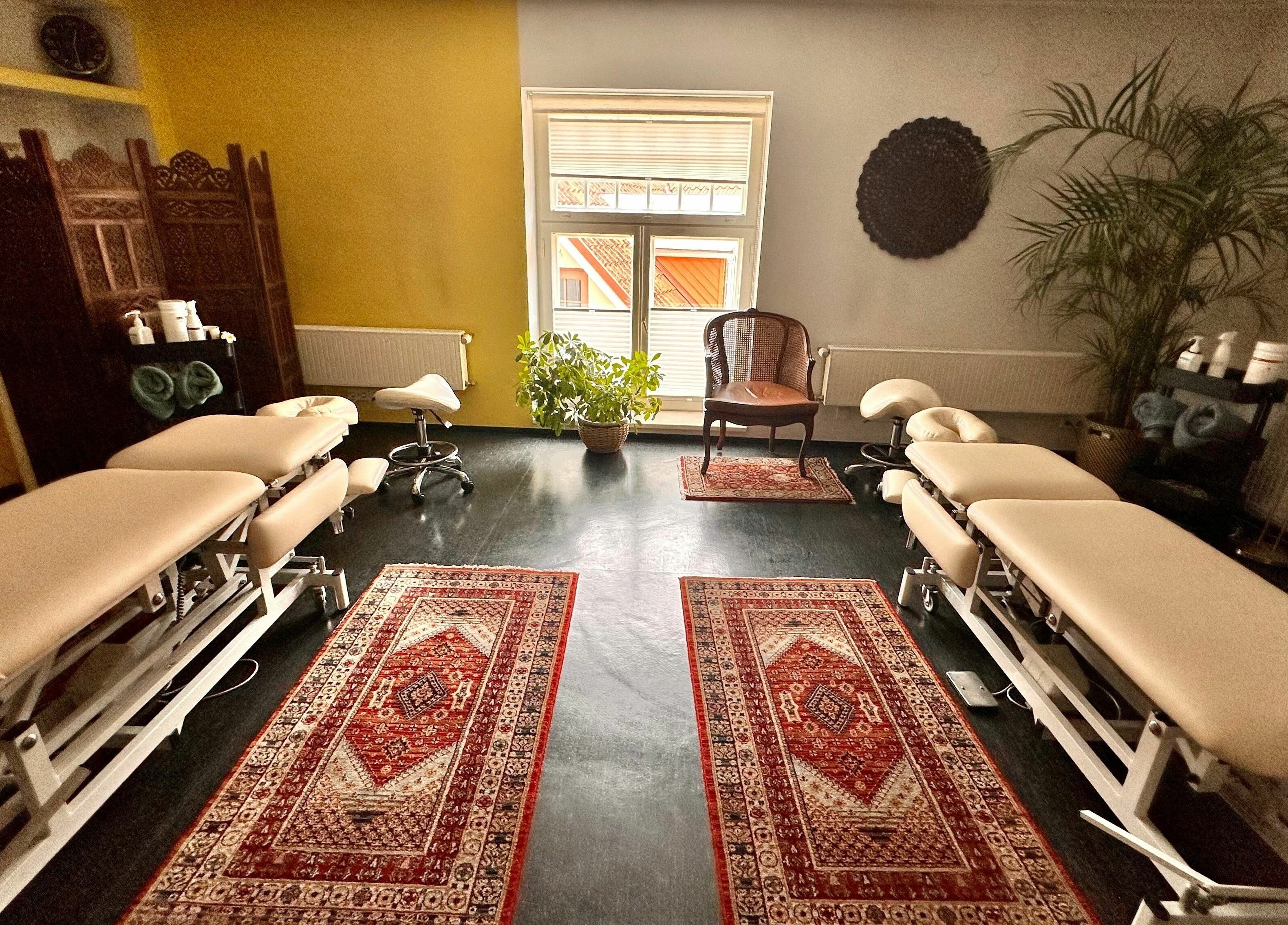 Luxurious massage room at MassaažiStaap, Tallinn, Harju maakond, EE, featuring plush tables and serene decor.