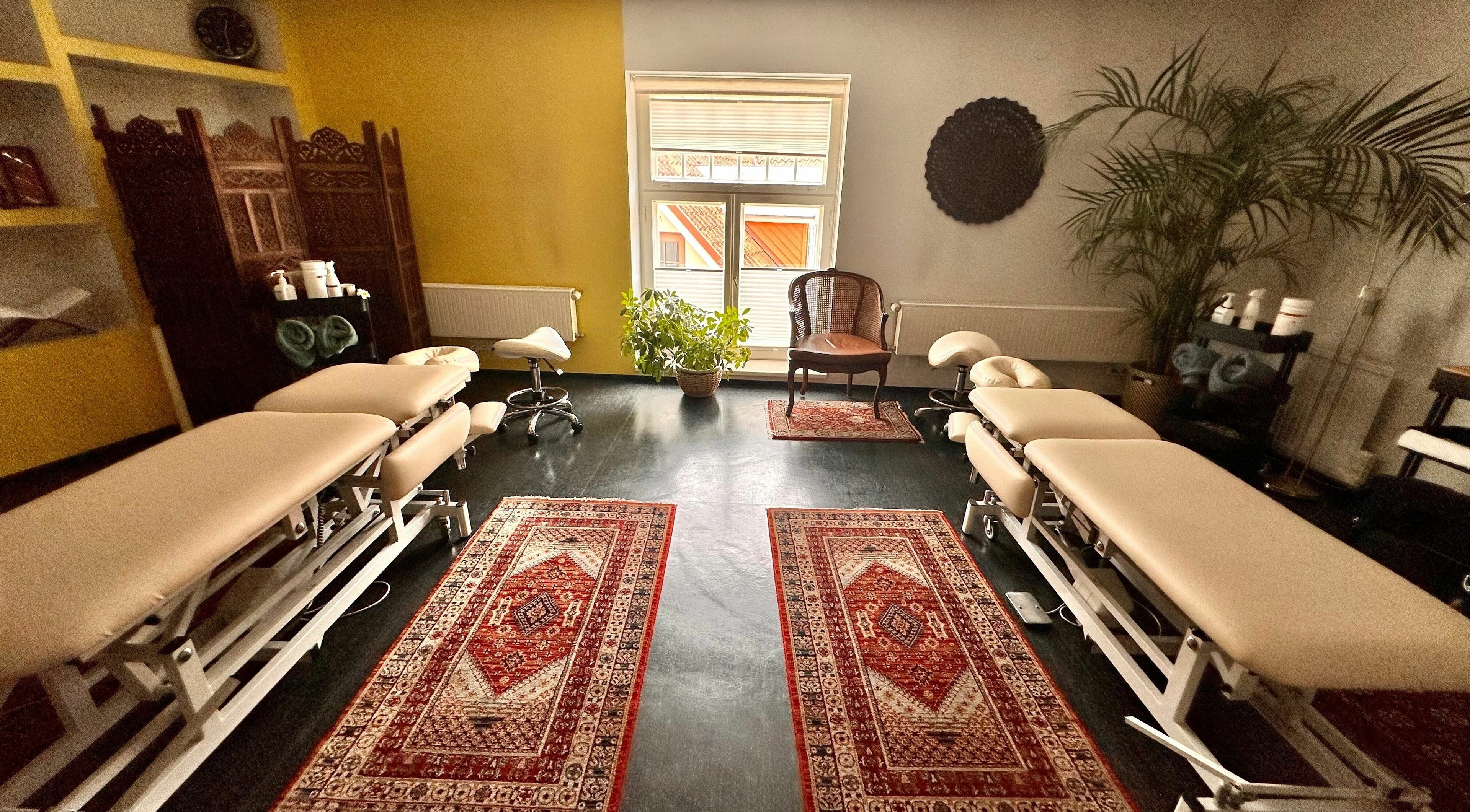 Luxurious massage room at MassaažiStaap, Tallinn, Harju maakond, EE, featuring plush tables and serene decor.