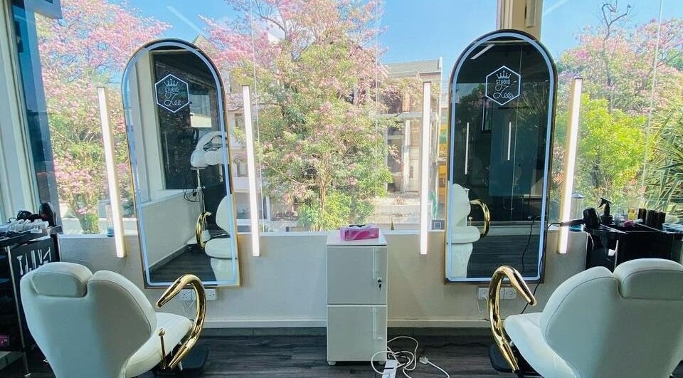 Stylish salon interior at Studio Zee | Colombo 07 with elegant mirrors and plush chairs in Colombo, Western Province, LK.