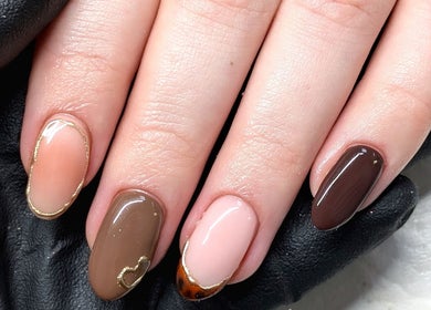 Beautiful nail art at Chloe Hartfield Nail Tech, Burgess Hill, England, GB, showcasing detailed brown designs.
