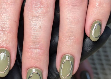 Stylish green nail art with accents by Chloe Hartfield Nail Tech, Burgess Hill, England, GB.