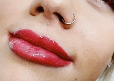 Close-up of glossy lips after cosmetic tattoo at Envious Effects Cosmetic Tattoo - Southport, Queensland, AU.