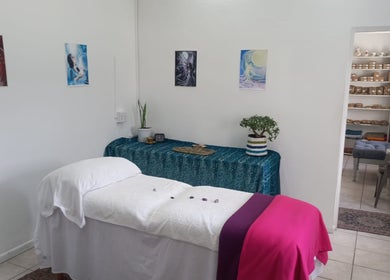 Healing space at Natasja King Reiki and Holistic Wellness in George, Western Cape, ZA with massage table.