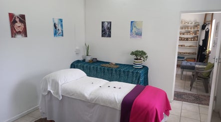Healing space at Natasja King Reiki and Holistic Wellness in George, Western Cape, ZA with massage table.