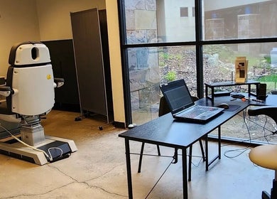 Comfortable treatment room at Head To Toe Permanent Hair Removal, El Dorado Hills, CA, US, showcasing advanced equipment.