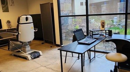 Comfortable treatment room at Head To Toe Permanent Hair Removal, El Dorado Hills, CA, US, showcasing advanced equipment.