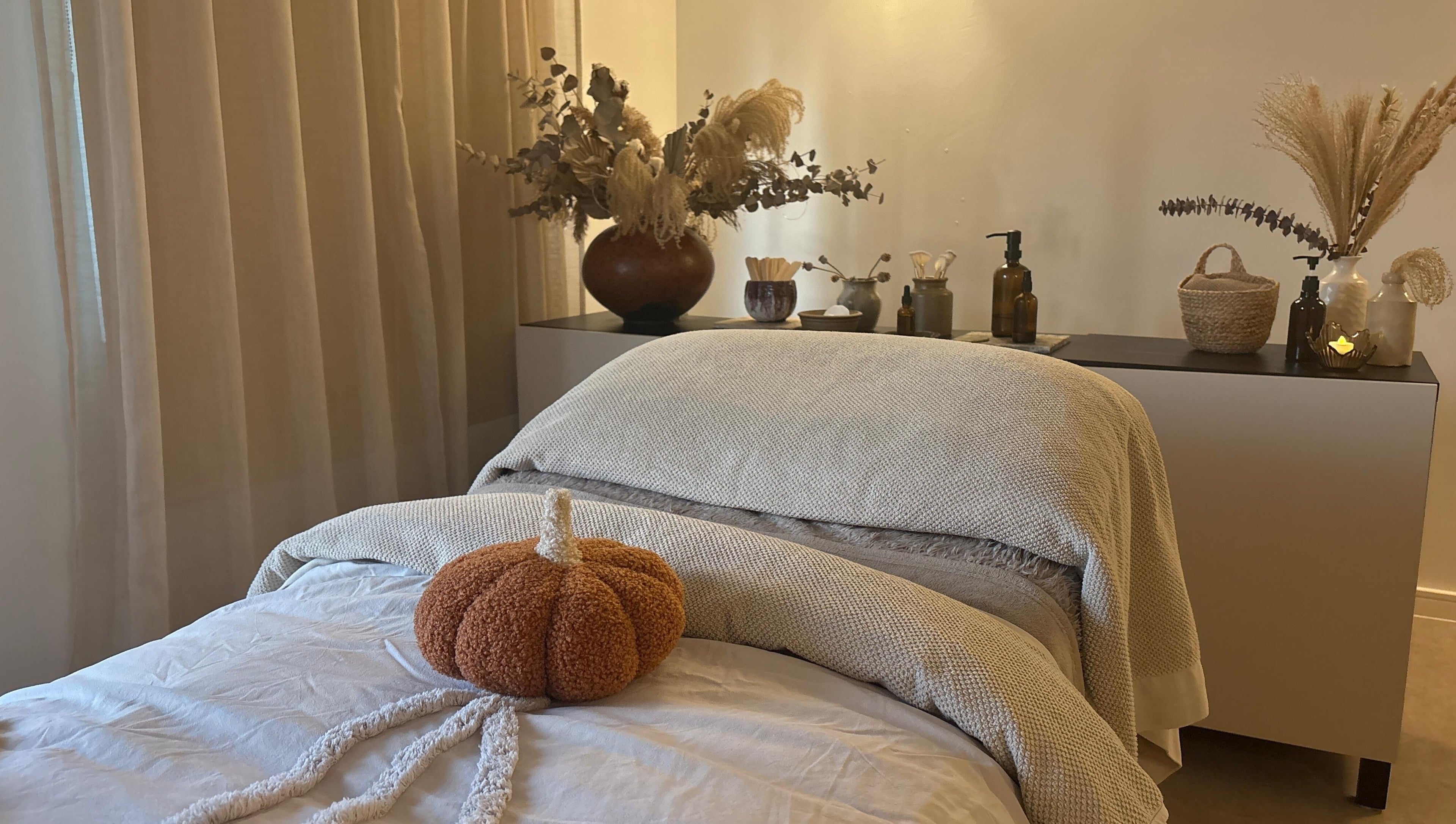 Cozy spa treatment room at Mon Remède Beauty, Bristol, England, GB, with calming decor and inviting atmosphere.