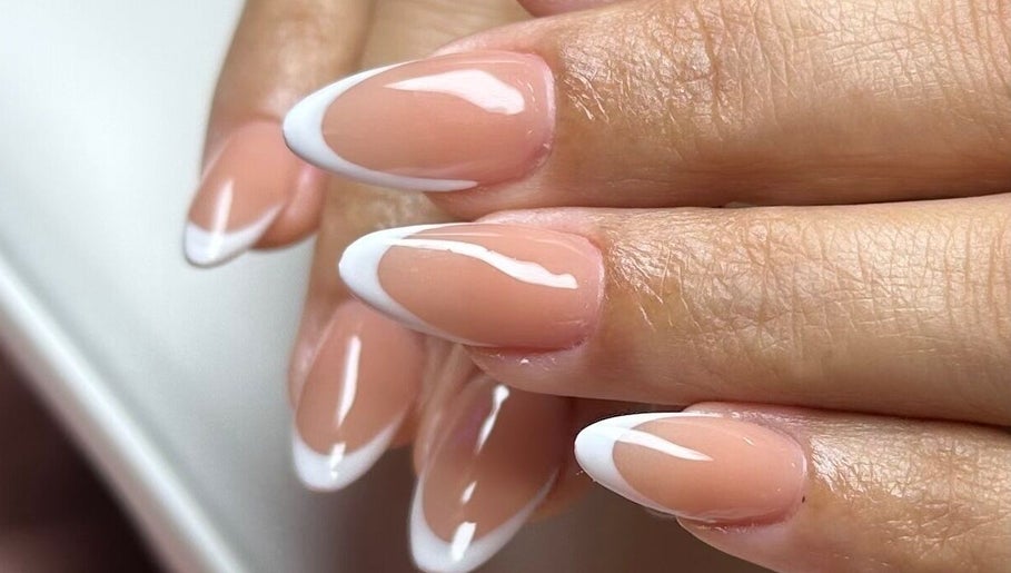 Beautiful French manicure at Gris Beauty Spa, Orlando, Florida, US, showcasing elegant nail art design.
