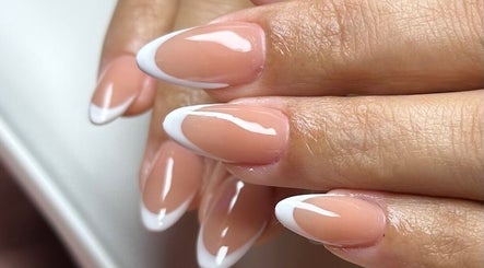 Beautiful French manicure at Gris Beauty Spa, Orlando, Florida, US, showcasing elegant nail art design.