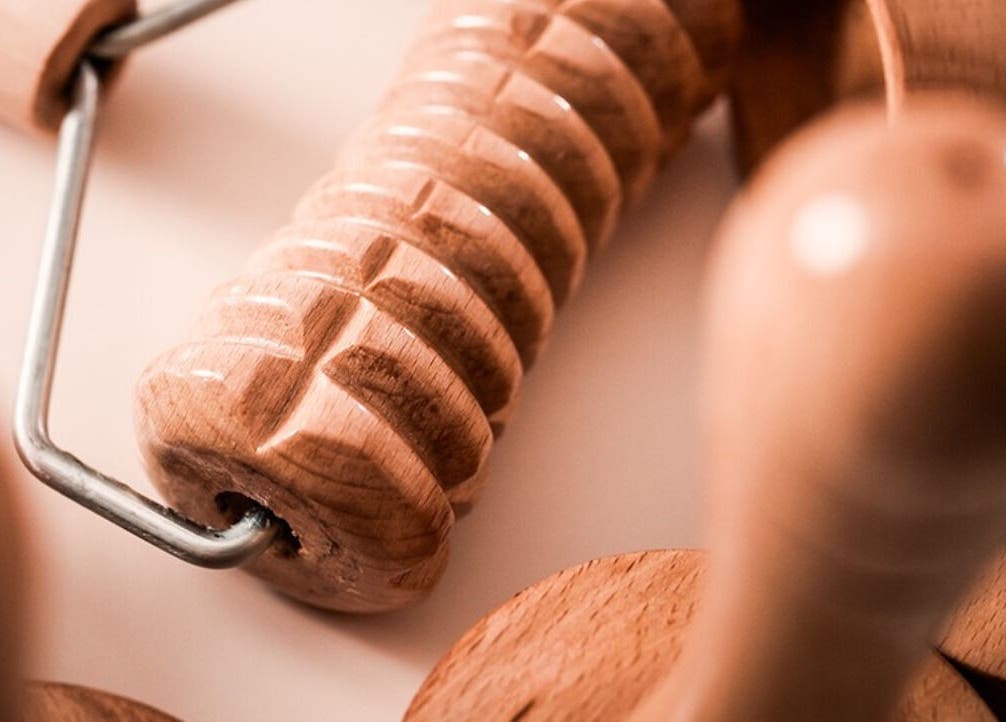 Wooden massage tools at AESTHE Home Spa and Home Massage, دبي, دبي, AE, showcasing relaxation and care.
