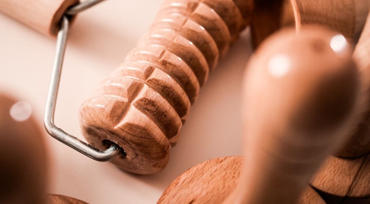 Wooden massage tools at AESTHE Home Spa and Home Massage, دبي, دبي, AE, showcasing relaxation and care.