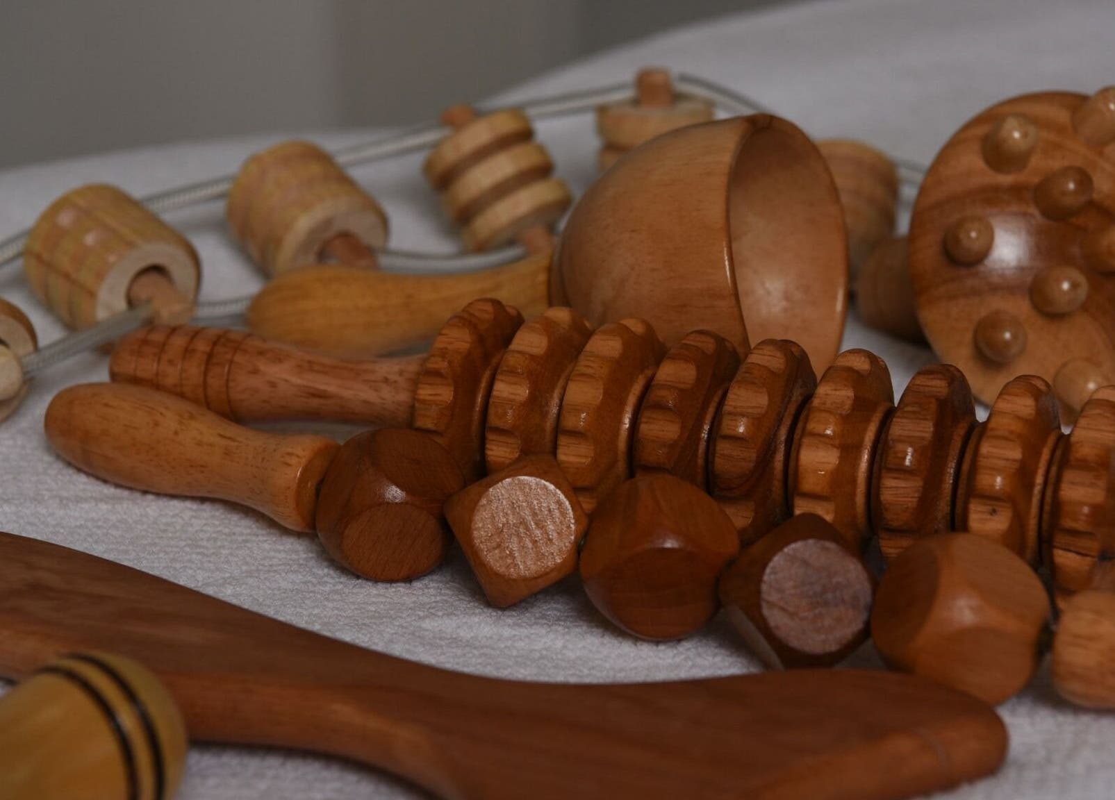 Wooden massage tools at Aesthetic Home Spa | Abu Dhabi, enhancing wellness in Abu Dhabi, AE.