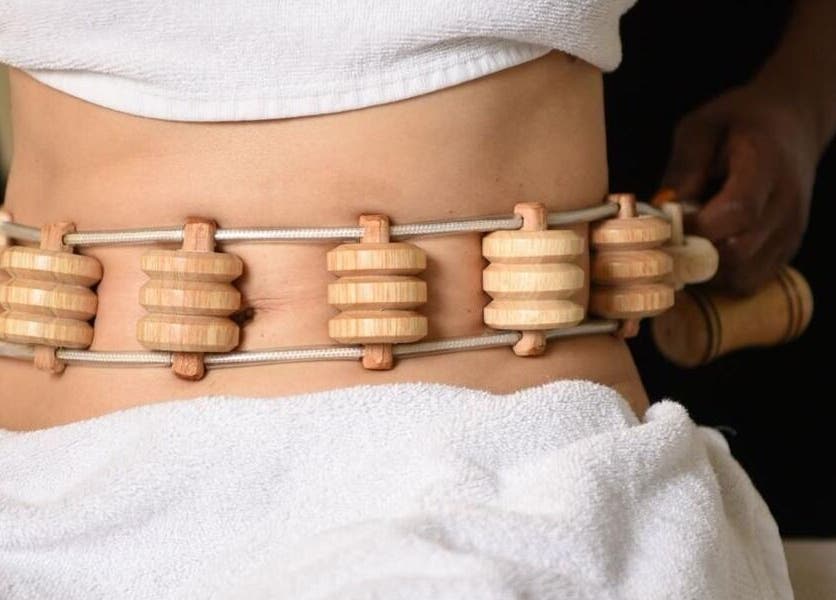 Wooden body massage therapy at Aesthetic Home Spa | Abu Dhabi, Abu Dhabi, AE for wellness and relaxation.