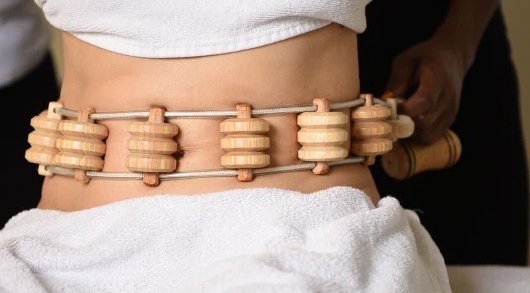Wooden body massage therapy at Aesthetic Home Spa | Abu Dhabi, Abu Dhabi, AE for wellness and relaxation.