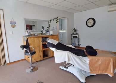 Relaxing treatment room at Time Out Lia’s Beauty Studio in Orkney, North West, ZA featuring modern decor.