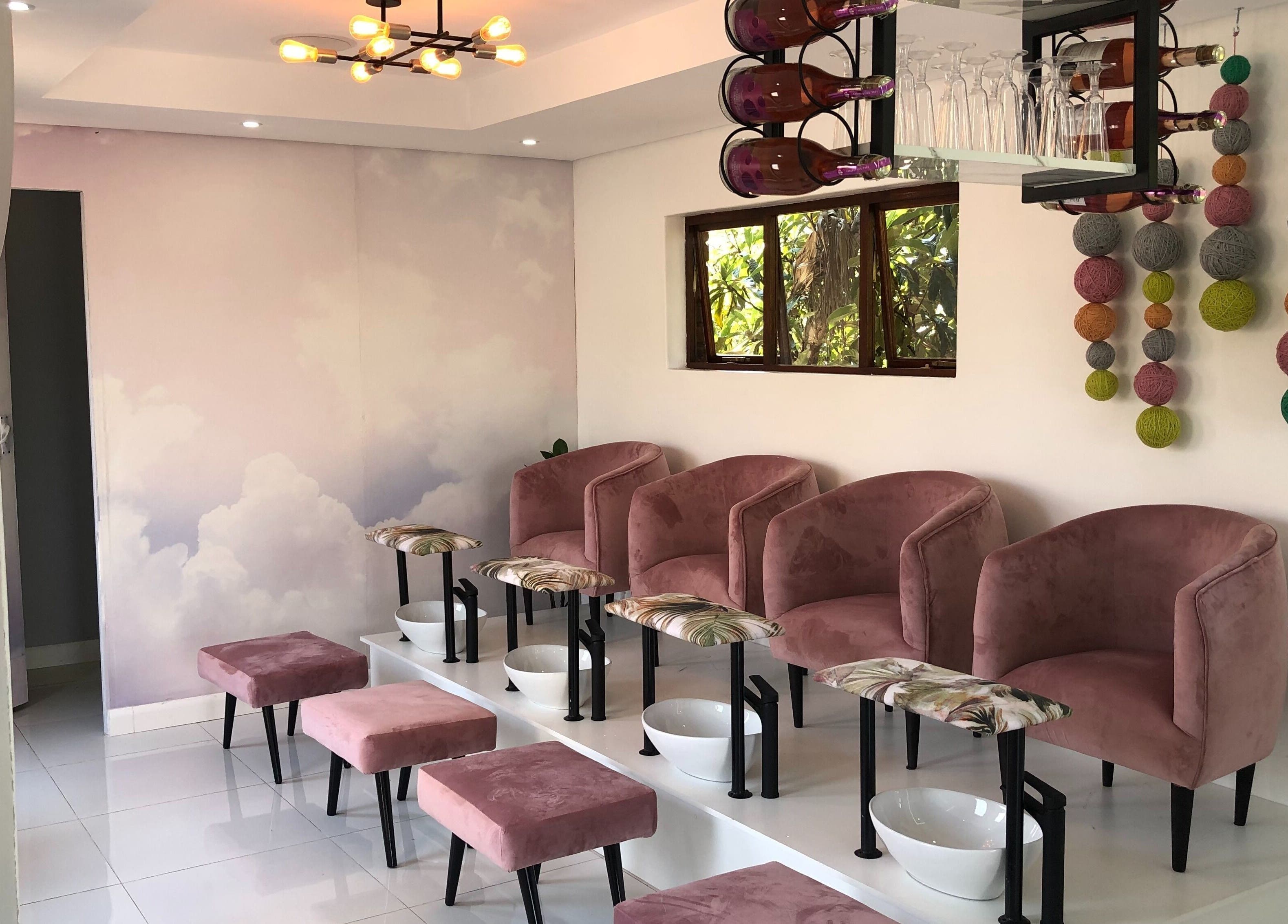 Elegant seating at Smoochie Kids Salon and Spa, Polokwane, Limpopo, ZA, featuring plush pink chairs.