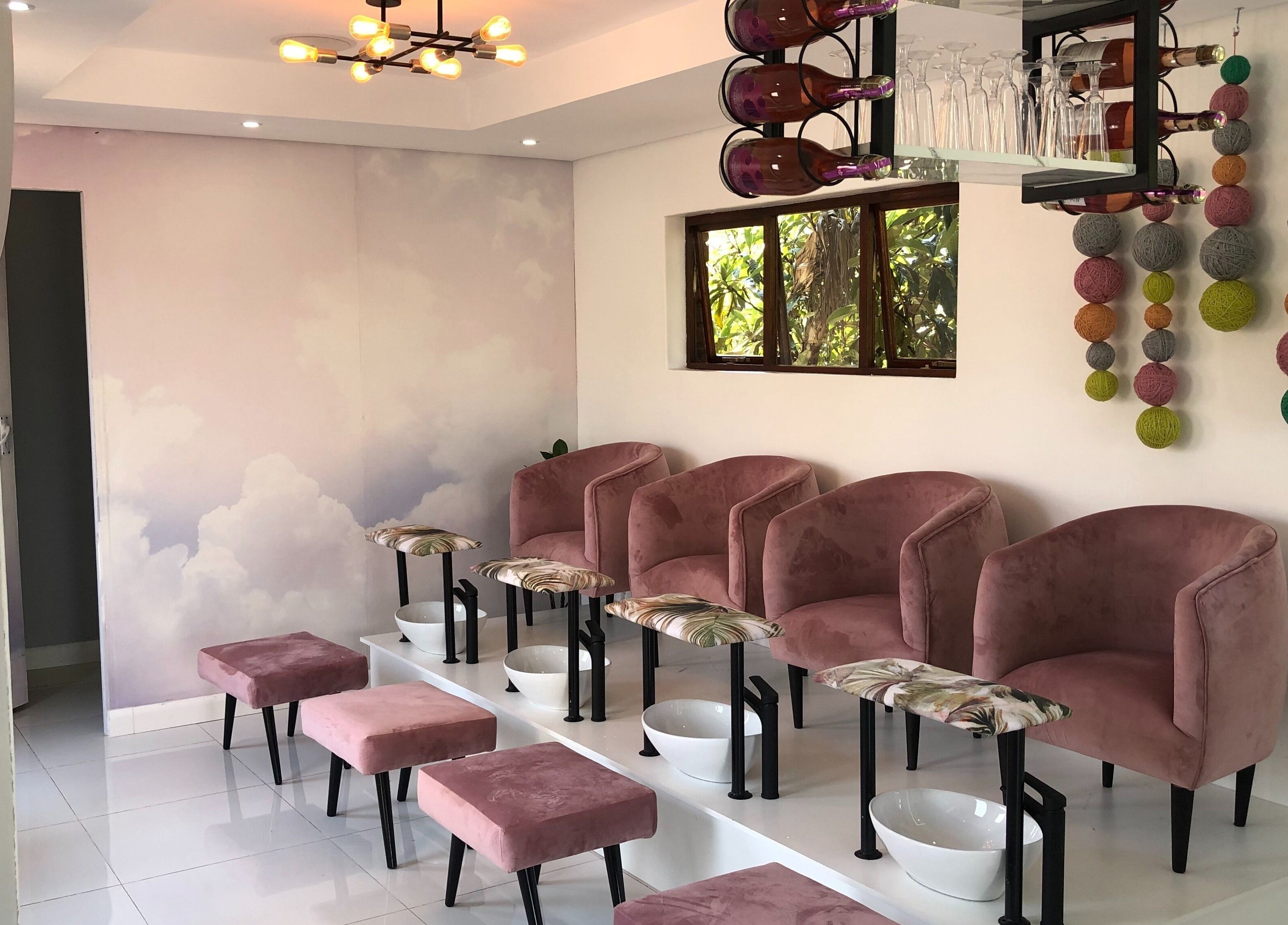 Elegant seating at Smoochie Kids Salon and Spa, Polokwane, Limpopo, ZA, featuring plush pink chairs.