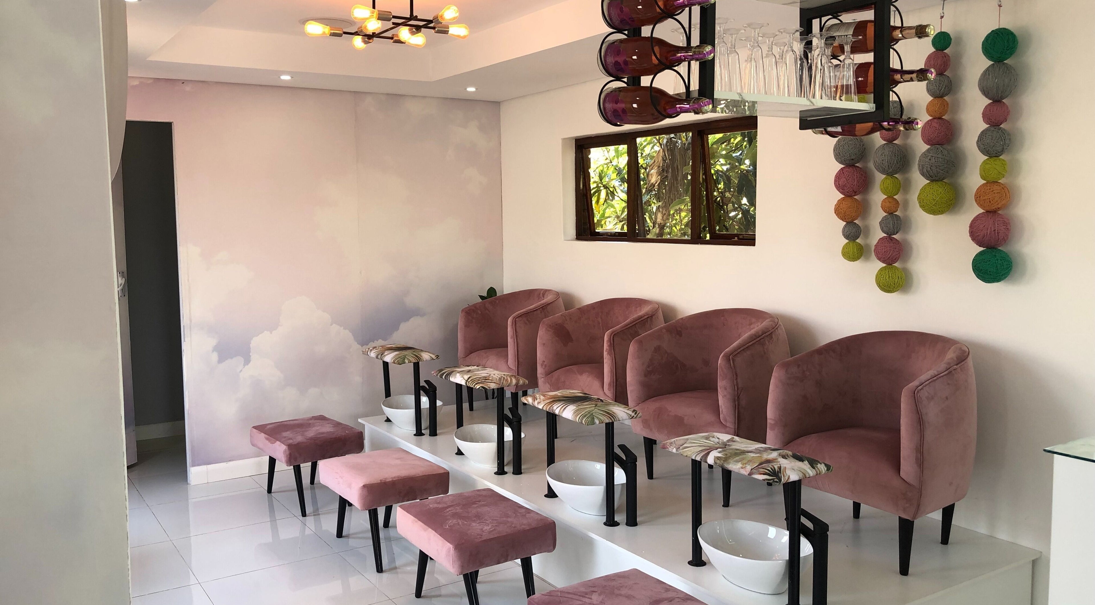 Elegant seating at Smoochie Kids Salon and Spa, Polokwane, Limpopo, ZA, featuring plush pink chairs.