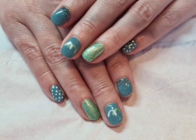 Elegant teal and glitter nails at Elegance Beauty, Bournemouth, England, GB.