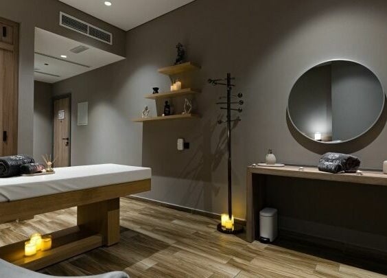 Elegant treatment room at Prive Spa, دبي, دبي, AE, with a massage table and ambient lighting.