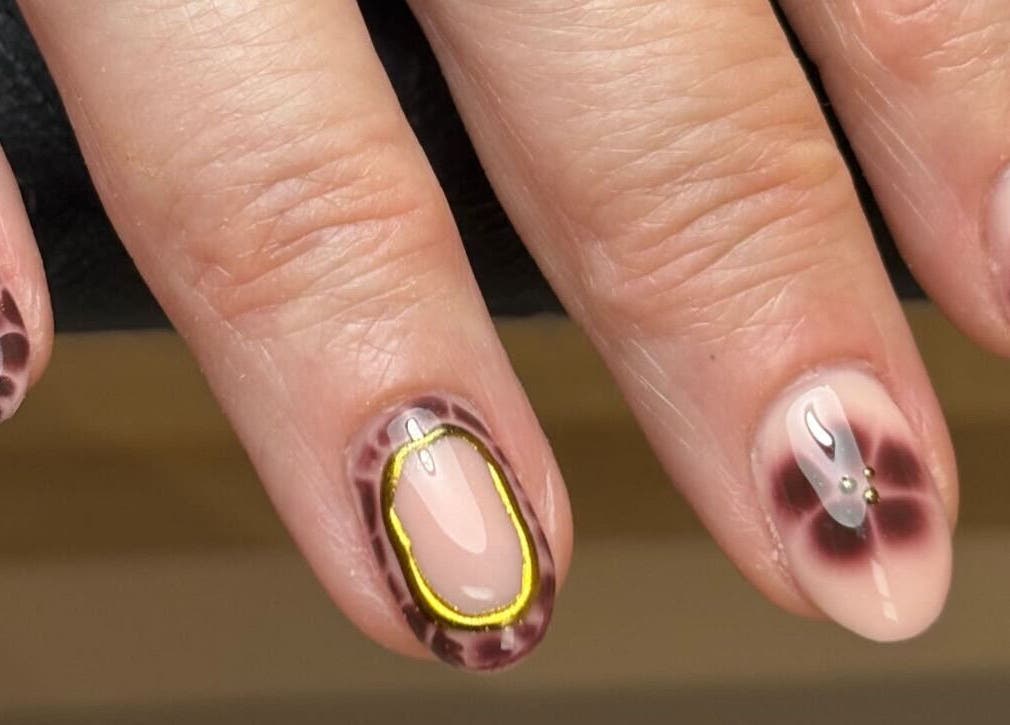 Beautifully designed nails with floral patterns at Nails by Ellie in Manchester, England, GB.