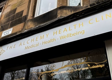 Entrance of The Alchemy Clinic Bridge of Weir in Scotland, GB showing its shopfront and signage.