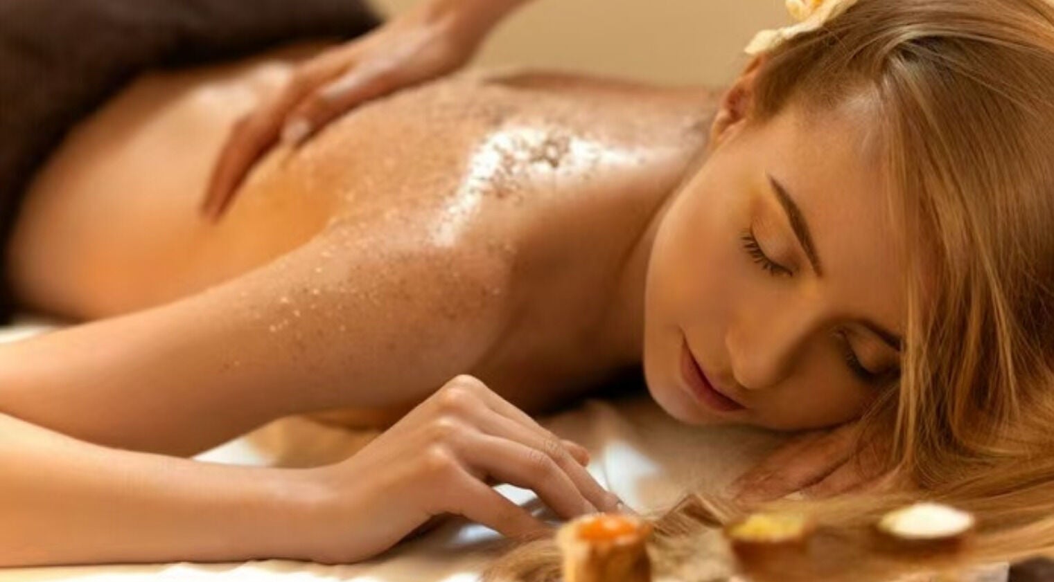 A woman enjoying a relaxing back massage at Relax Spa, Allen, Texas, US.