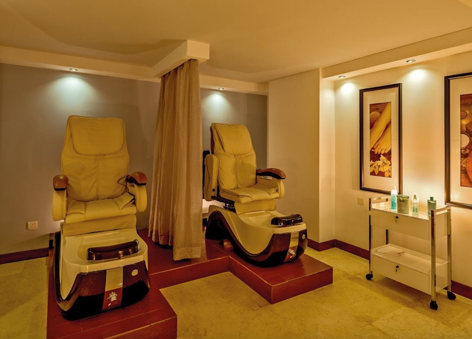 Luxurious spa seating at The Grand Hotel Elemis Spa in Gozo, MT, offering ultimate relaxation and comfort.