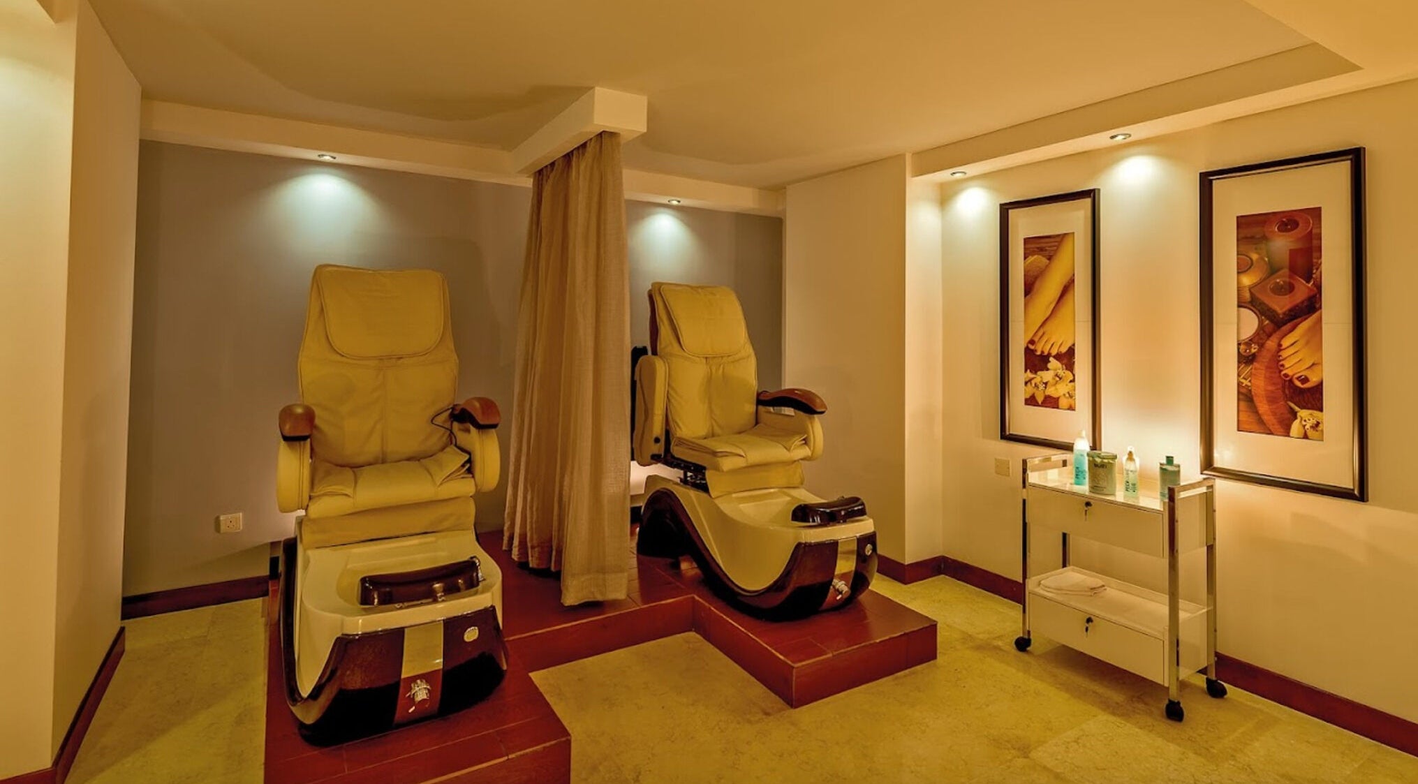 Luxurious spa seating at The Grand Hotel Elemis Spa in Gozo, MT, offering ultimate relaxation and comfort.