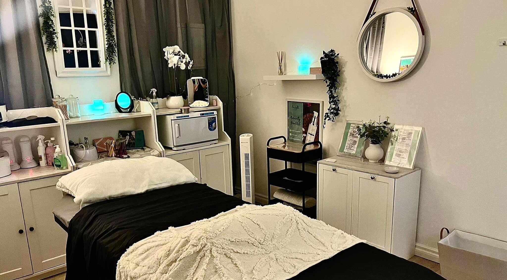 Cozy treatment room at Whiteleaf Beauty Salon, Mandurah, Western Australia, AU with plush bedding and soothing decor.