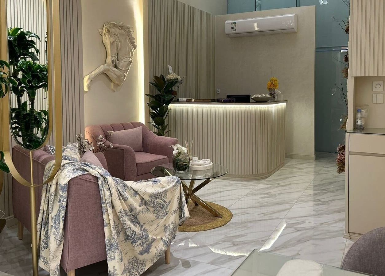 Modern reception area at Gabriella Salon, Al Khobar, Eastern Province, SA with chic decor and comfortable seating.