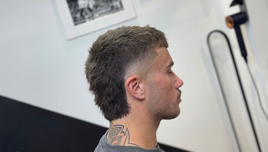 Profile of a stylish mullet haircut at Syndicat Barber, Melbourne, Victoria, AU.