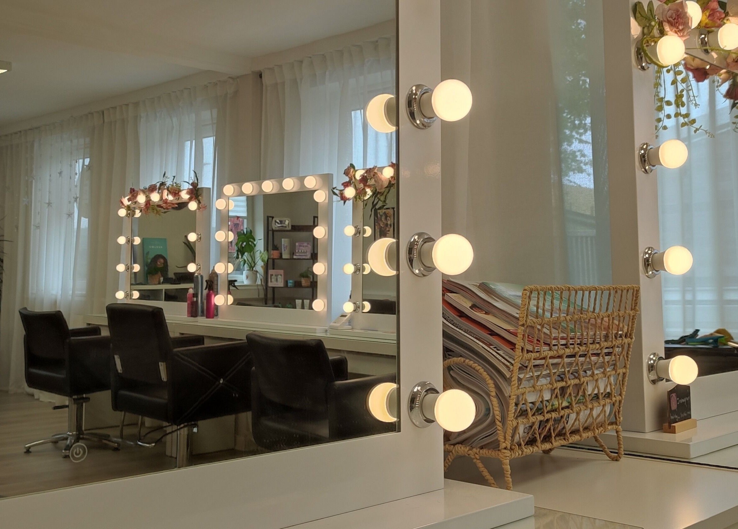 Jessica Gilbert Hair salon in Corbridge, England, GB showcasing elegant vanity mirrors with lights.