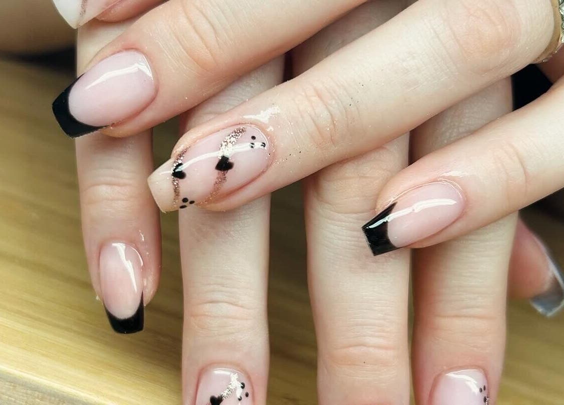 Chic nail art with black tips at Nails By Jade, Canvey Island, England, GB, showcasing intricate design.