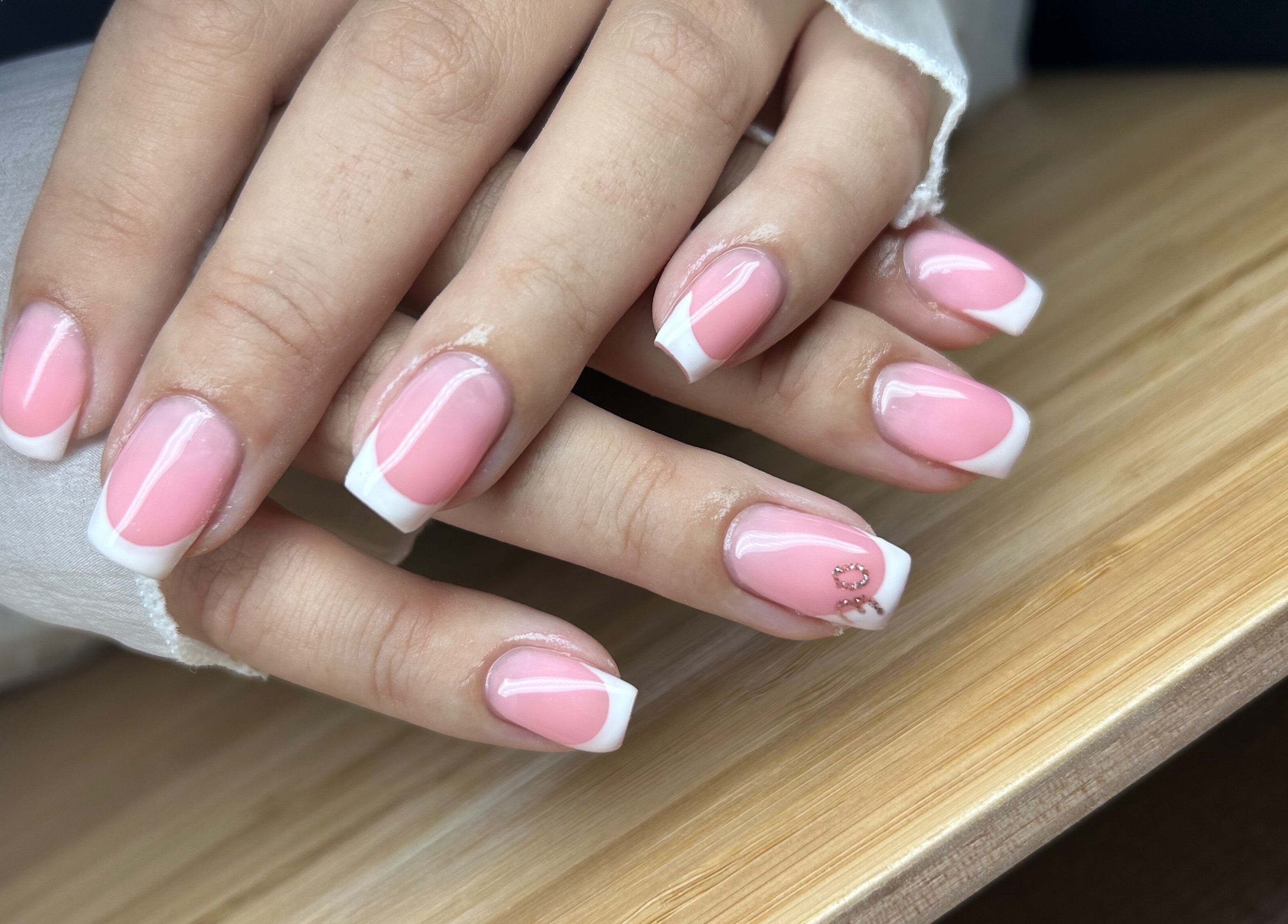 Elegant pink French manicure at Nails By Jade, Canvey Island, England, GB.