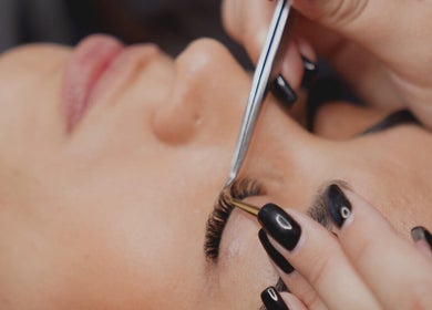 Expert eyelash extension application at Dead Pretty Beauty Bar, North Rothbury, New South Wales, AU.