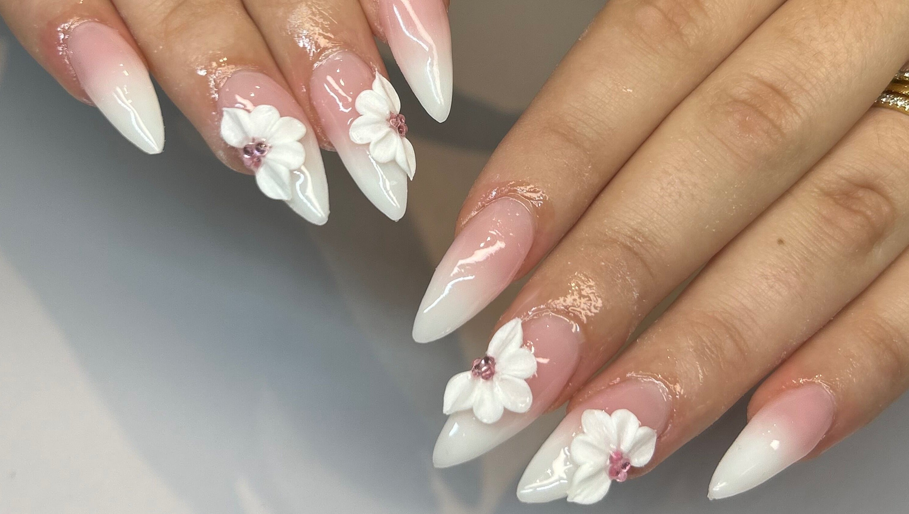 Elegant floral nail art at Polished By Jules in Caledon, Ontario, CA, showcasing exquisite design.