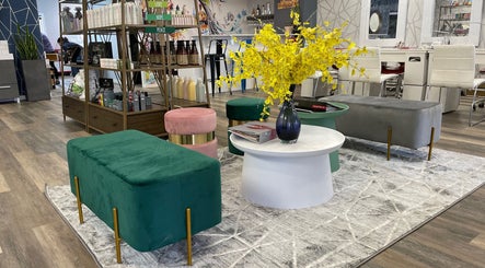 Vibrant lounge area in Friendly Nails - Fort Sask, featuring green and pink seating. Fort Saskatchewan, Alberta, CA.