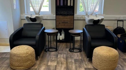 Modern washing chairs at Hair by Zoe Fellows, Corbridge, England, GB with natural decor.