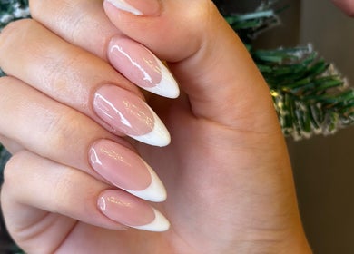 Elegant French manicure at Heathers Beauty in Harlow, England, GB showcasing stylish nail art.