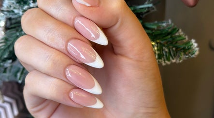Elegant French manicure at Heathers Beauty in Harlow, England, GB showcasing stylish nail art.